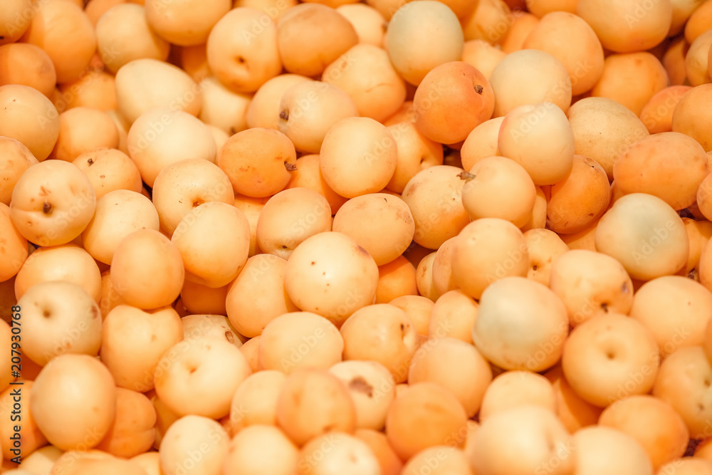 Many orange apricots, background Many orange apricots, background