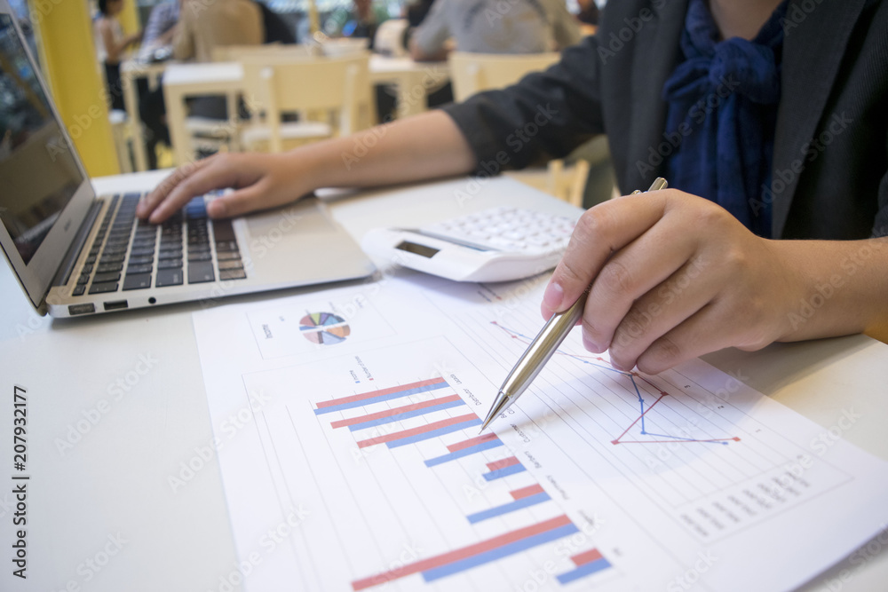 Young women are checking the company's finances to prepare for further business development.