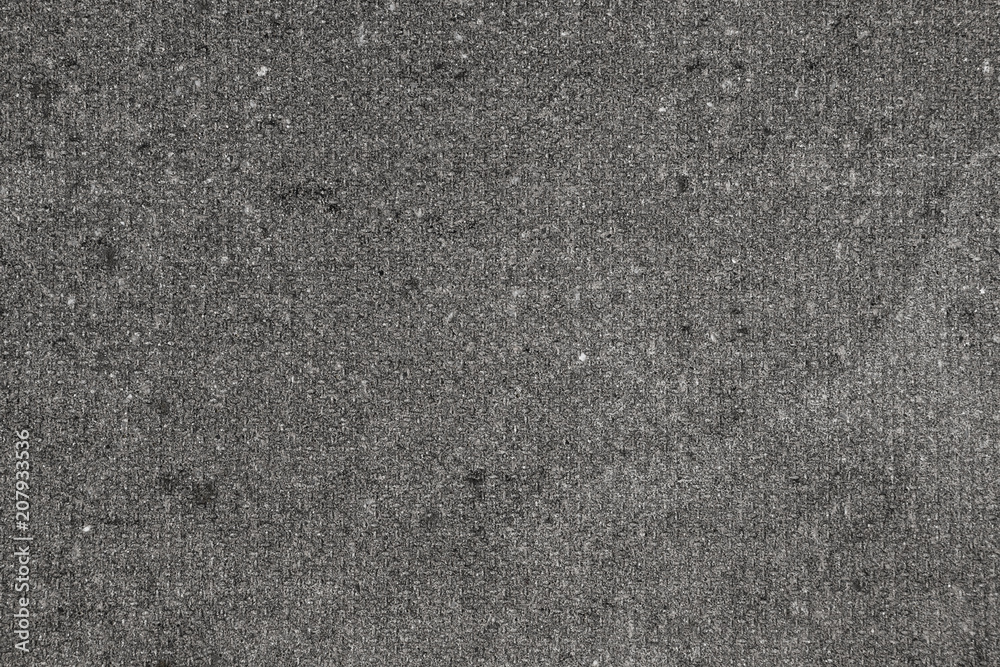 Fototapeta premium Subtle grain concrete texture close-up. Abstract black and white gritty grunge background