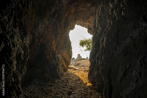 scenic of light on exit from cave background