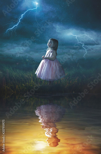 Little girl in rain storm