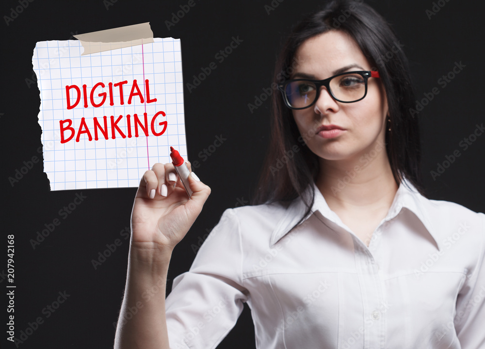 The concept of marketing, technology, the Internet and the network. A young businessman shows what is important for business: Digital banking The concept of marketing, technology, the Internet and the network. A young businessman shows what is important for business: Digital banking
