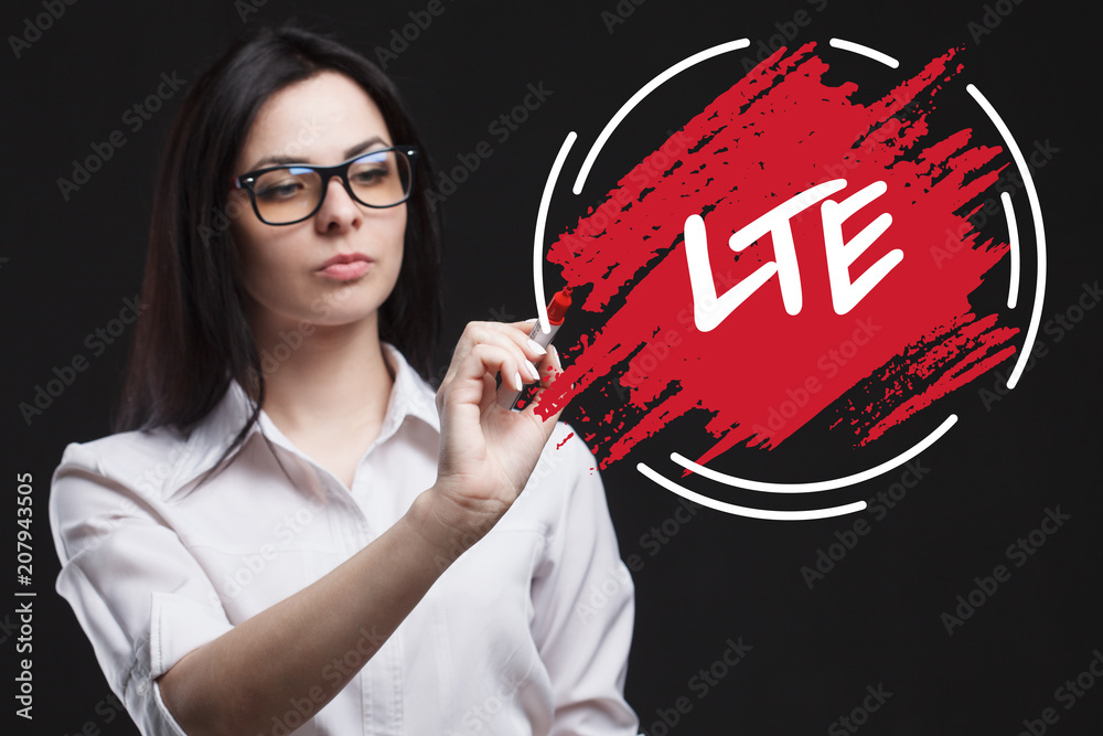 The concept of marketing, technology, the Internet and the network. A young businessman shows what is important for business: LTE The concept of marketing, technology, the Internet and the network. A young businessman shows what is important for business: LTE