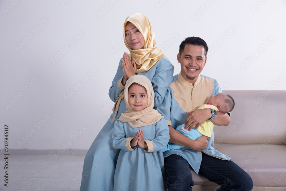 beautiful muslim family with kids together