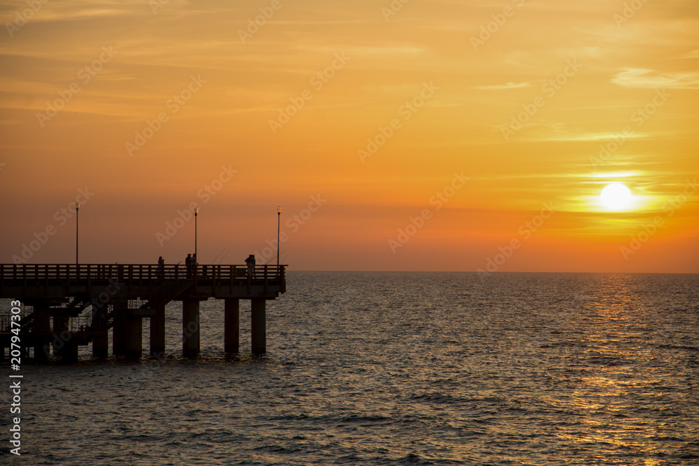 Sunset on the beach at Baltic Sea, Kaliningrad.