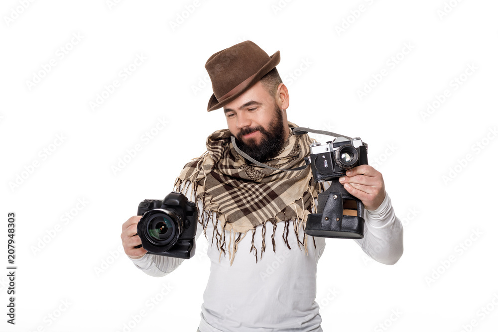 photographer chooses between retro and digital camera photographer chooses between retro and digital camera