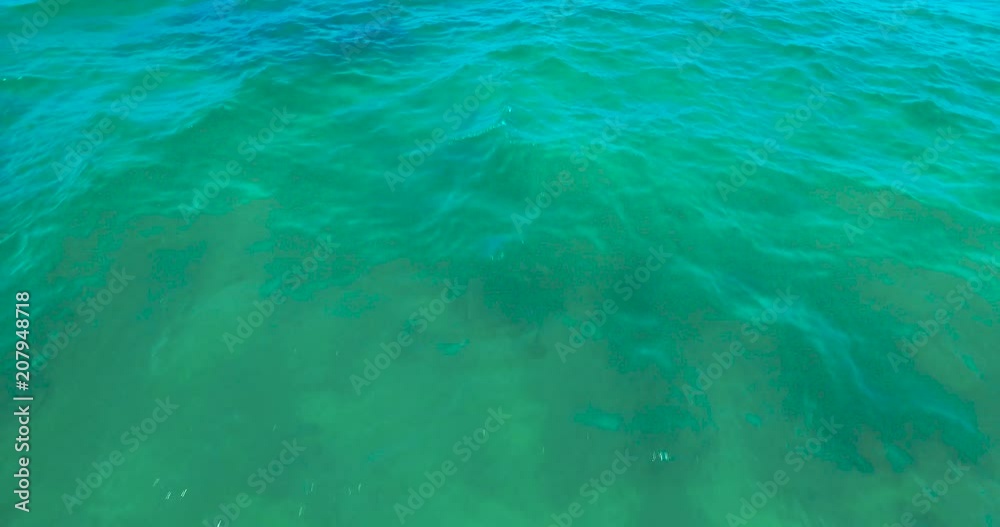 Aerial Fly Over Of Ocean Water Surface With Blue Sea Ripples And Waves Slow Aerial Fly Over Of Ocean Water Surface With Blue Sea Ripples And Waves Slow