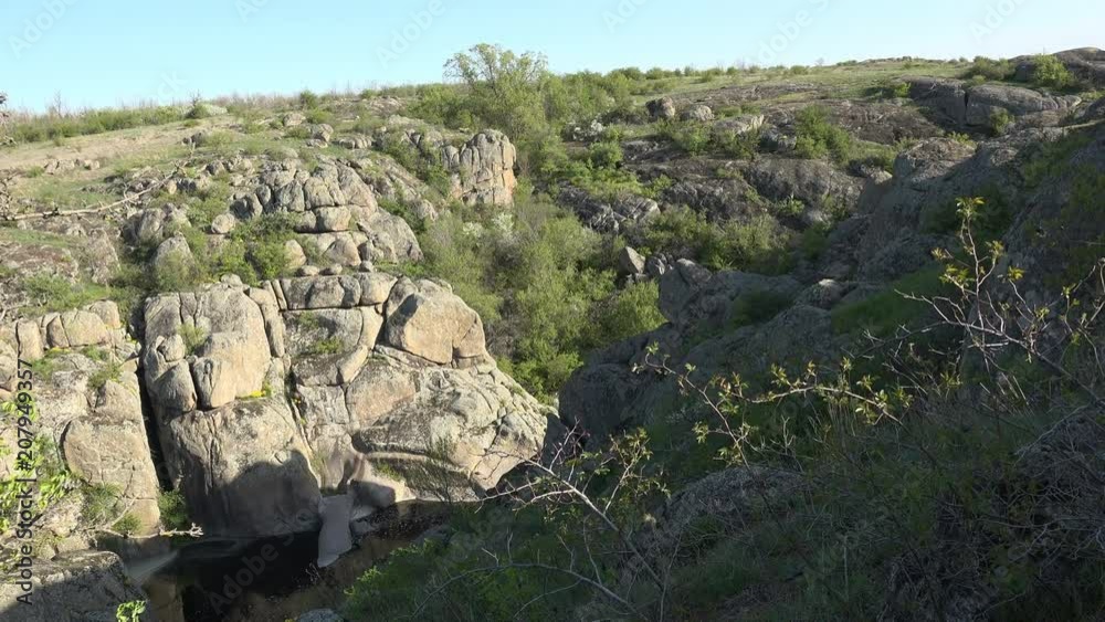 Summer Landscape on canyon and fast river at bottom of cliff Summer Landscape on canyon and fast river at bottom of cliff