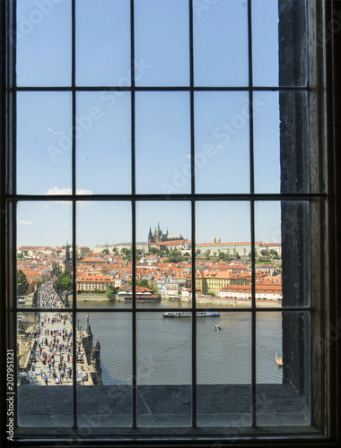 view of the Charles bridge from the window of the Old Town Bridge Tower in Prague, Czech Republic