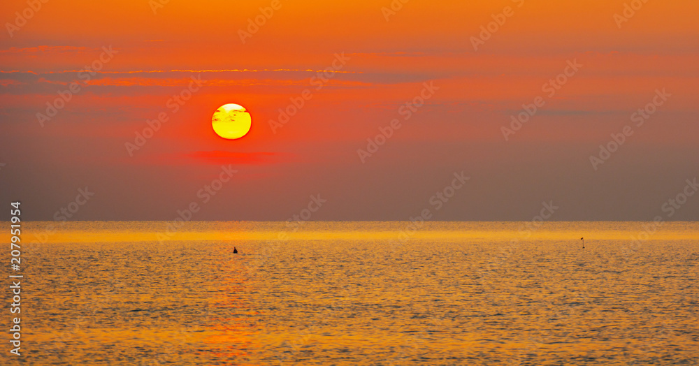 view of a bright sunset on the sea