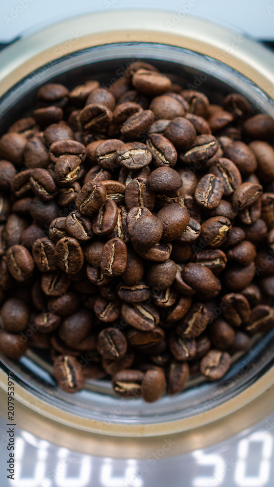 Fototapeta premium Weighing Coffee Beans