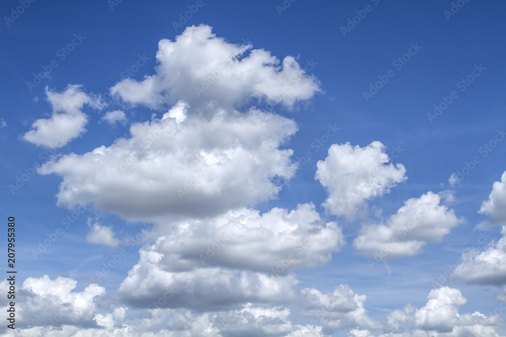 Background of beautiful blue sky with clouds. Looking up view. Close Up. Background of beautiful blue sky with clouds. Looking up view. Close Up.