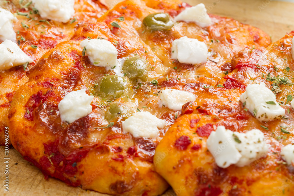 tris of mixed pizza on wood with ingredients tris of mixed pizza on wood with ingredients
