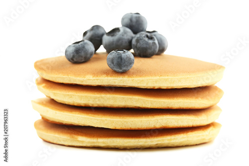 Tasty pancakes with blueberries isolated on white