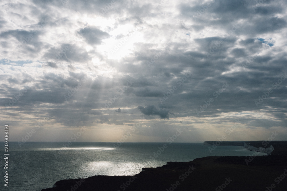 Fototapeta premium Sun bursting through clouds