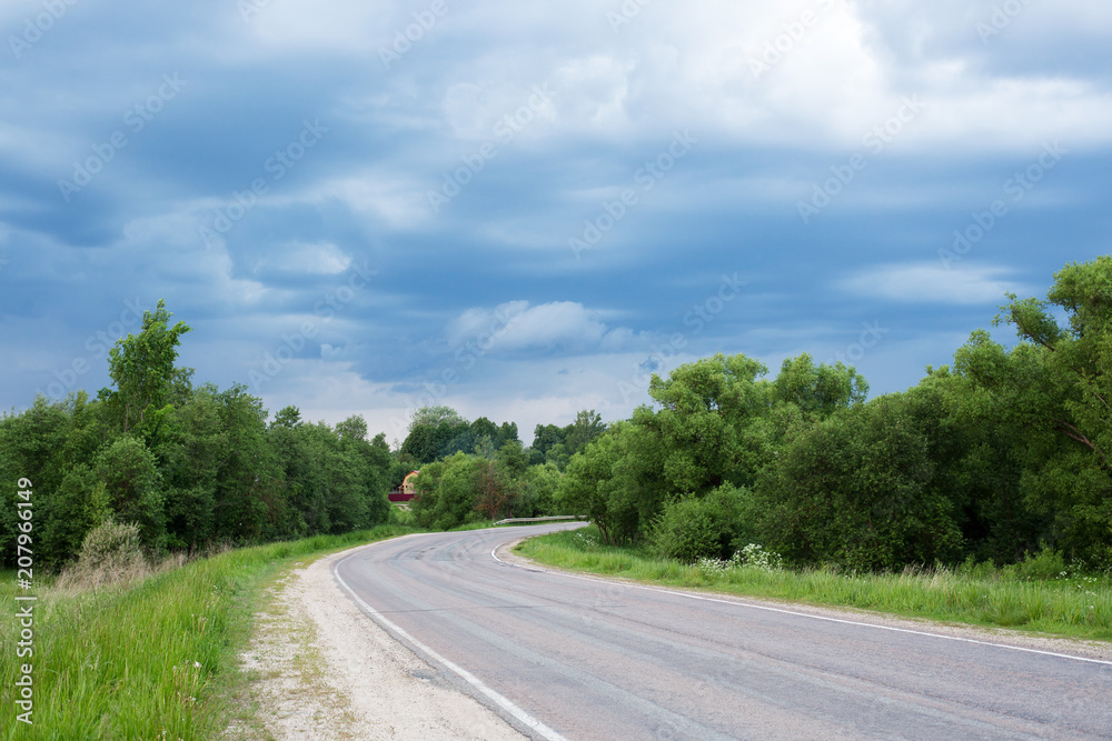 The road is in a rural location