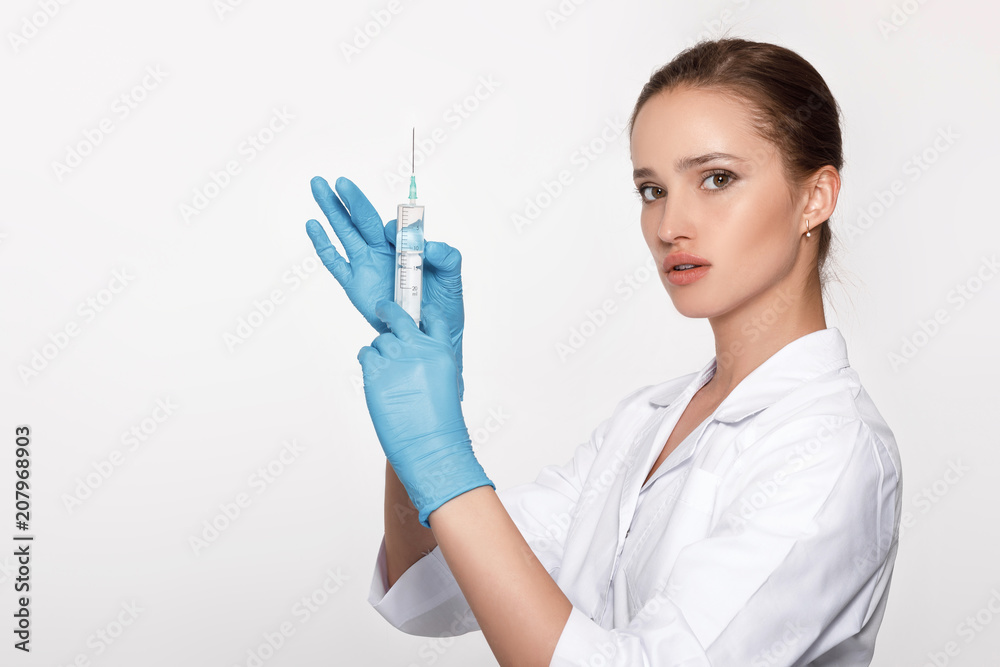 doctor in uniform and gloves with syringe doctor in uniform and gloves with syringe