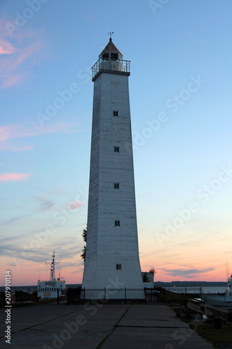 lighthouse on the waterfront of Krondshtat at sunset