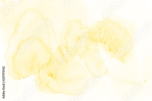 Beautiful very soft yellow watercolor background - watercolor paints on a rough texture paper