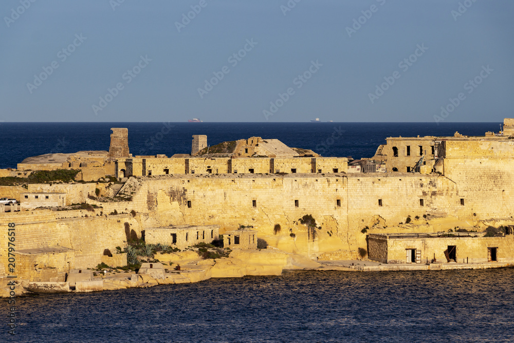 Fototapeta premium View of part of the Ricasoli Fort, Kalkara from the Lower Barakka Gardens in Valletta, Malta