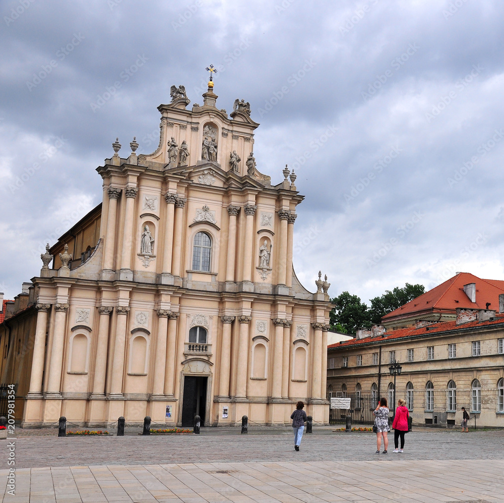 Beautiful baroque church in the street of Warsaw, Poland