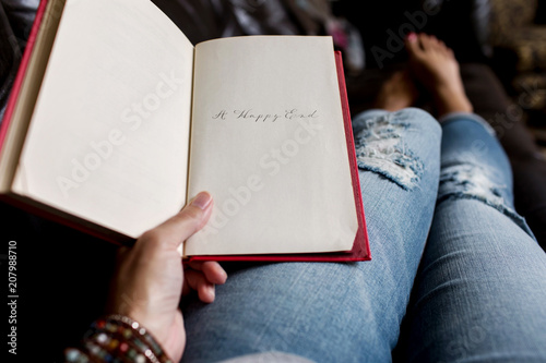 woman holding a book with 