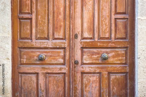 old wooden door in antique house close-up