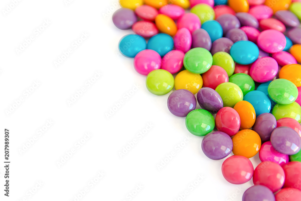 colorful chocolate coated candy isolated on white background. with copy space colorful chocolate coated candy isolated on white background. with copy space