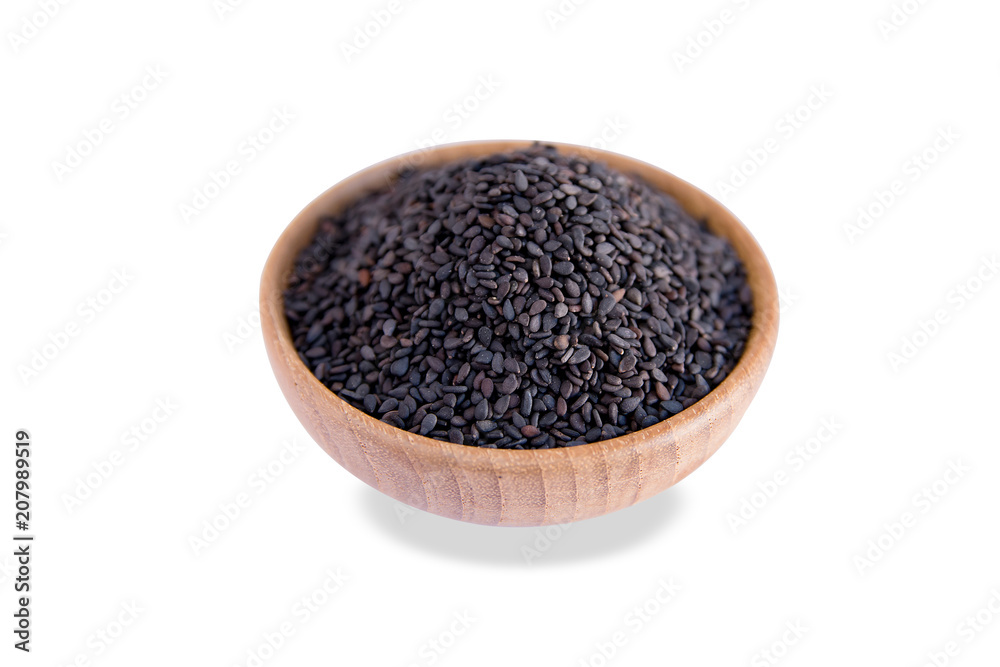 black sesame in wooden bowl isolated on white background with clipping path black sesame in wooden bowl isolated on white background with clipping path