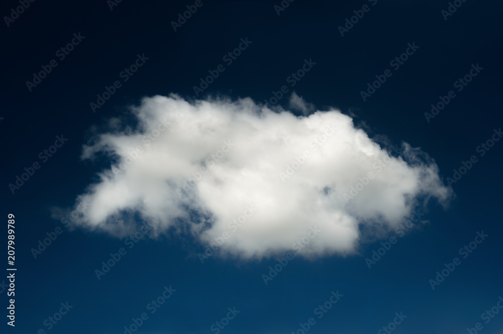 A single lonely cloud in the middle of the sky. A single lonely cloud in the middle of the sky.