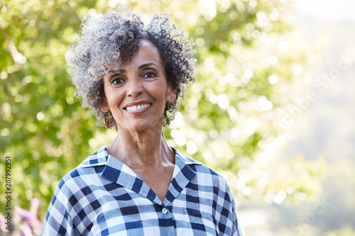 Closeup portrait of African American Senior woman in nature