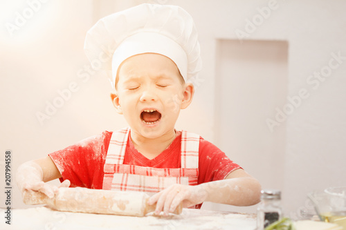 Little boy in a suit of the...