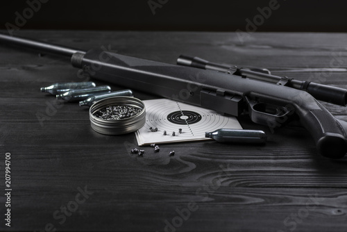 air rifle on co2 and ammunition and shields photo