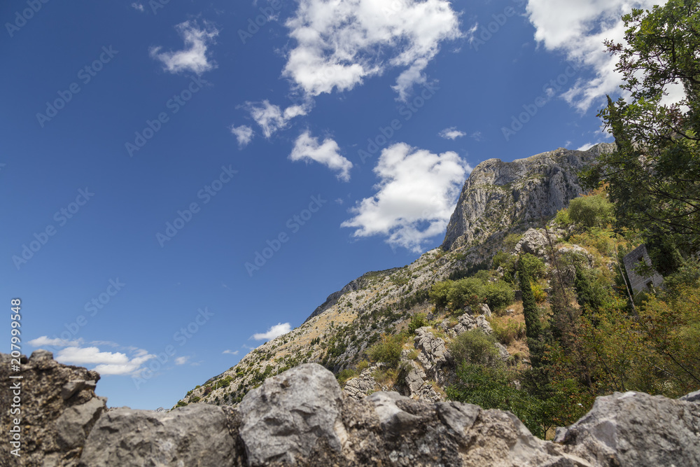 Wide angle view of Pestin Grad, a rocky ridge above Kotor, Montenegro.