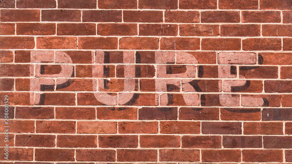 Obraz premium Red Brick wall advertising seasonal garden supplies
