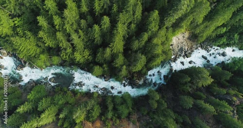 Drone Flyover Blue River Rapids Spring Flowing Above Old Growth Forest Trees