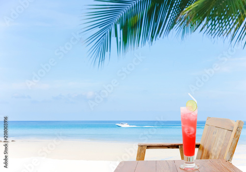 cocktail with a heavenly view on paradise island.Sand beach and Beautiful sea background in summer.