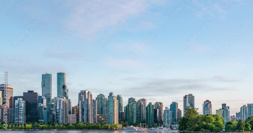 video panorama of high-rise buildings of a modern seaside city and parked yachts and ships