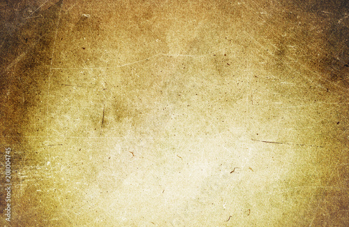 Grunge texture of old brown paper, dust, scratches