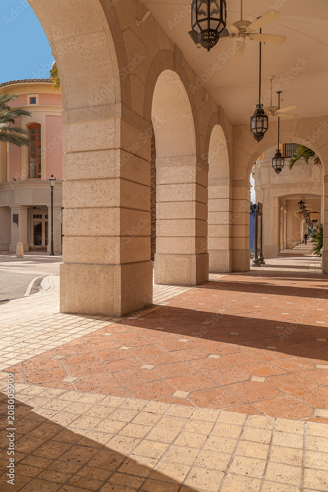 Upscale downtown strip mall with a shopper. Upscale downtown strip mall with a shopper.