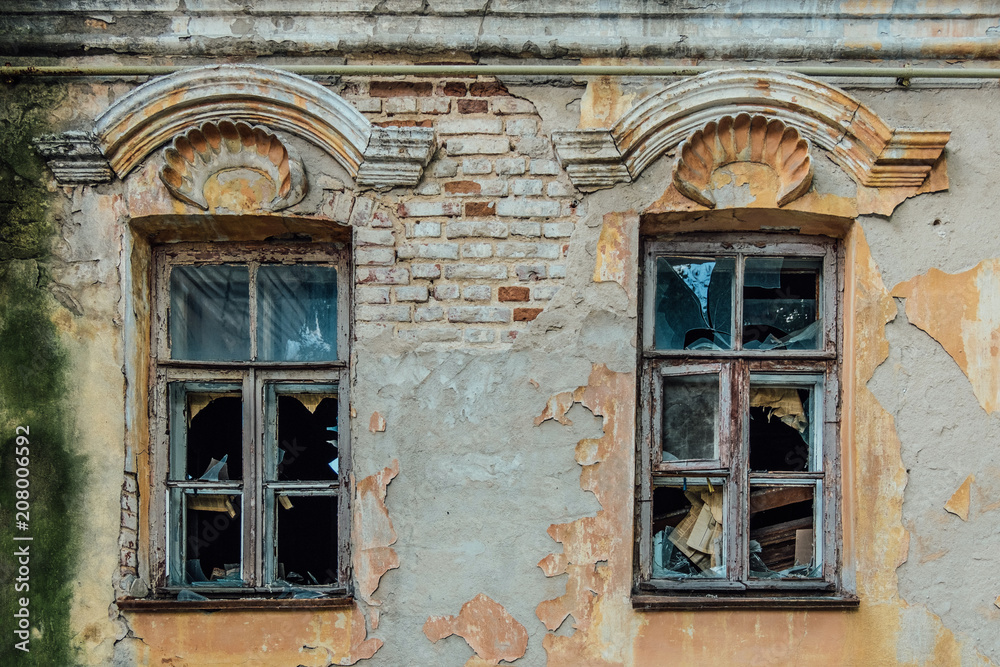 Old broken windows of abandoned mansion Old broken windows of abandoned mansion