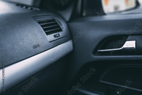 Passenger Side of a Car Featuring Dashboard Airbag Compartment © photographyfirm