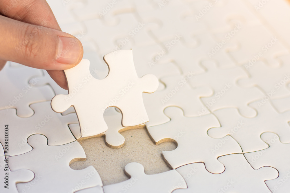 Hands Put Puzzle Pieces Last Jigsaw Puzzle, Business Concept For Completing  The Final Puzzle Piece,Business Success Concepts Stock Photo | Adobe Stock