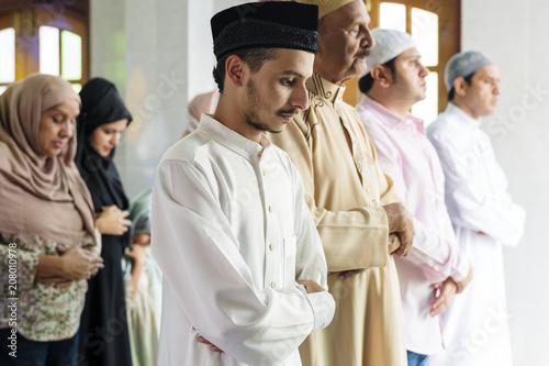 Muslim prayers in Qiyaam posture