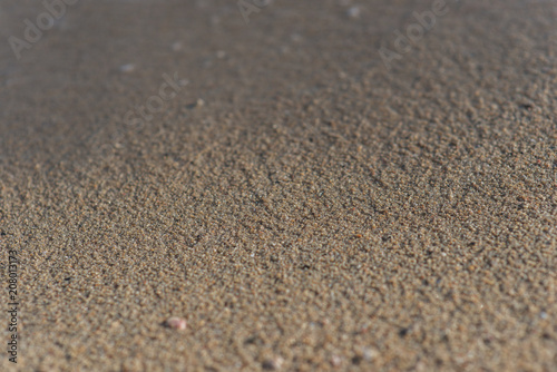 Close up of beach sand near water