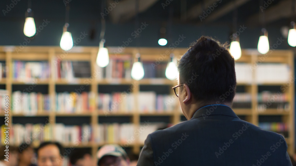 Teacher Professor Educator Speaking and Presenting to Students in Classroom. Presenter Educator  Giving Presentation. Education Business