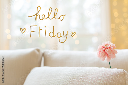 Hello Friday message with a flower in a bright interior room sofa