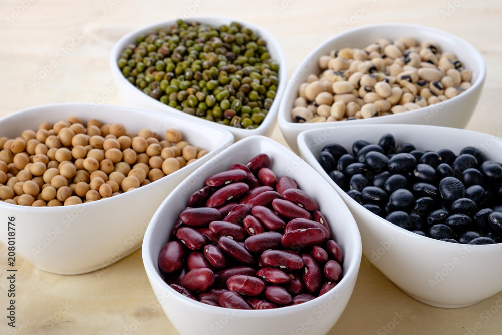 Healthy food concept, variety of colorful beans. Mung beans. black beans , soybean, red kidney , black eye pea. Healthy food concept, variety of colorful beans. Mung beans. black beans , soybean, red kidney , black eye pea.