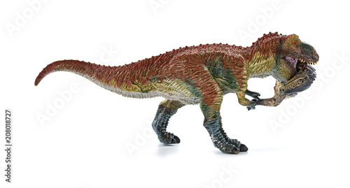 tyrannosaurus biting a dinosaur body with blood on white background © Freer