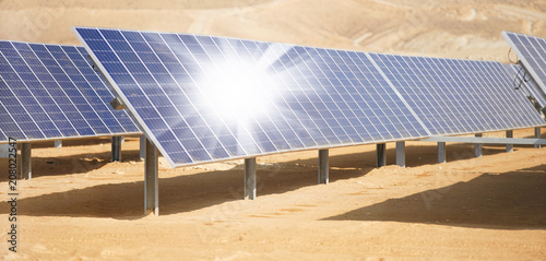 industrial landscape solar batteries in the desert photo